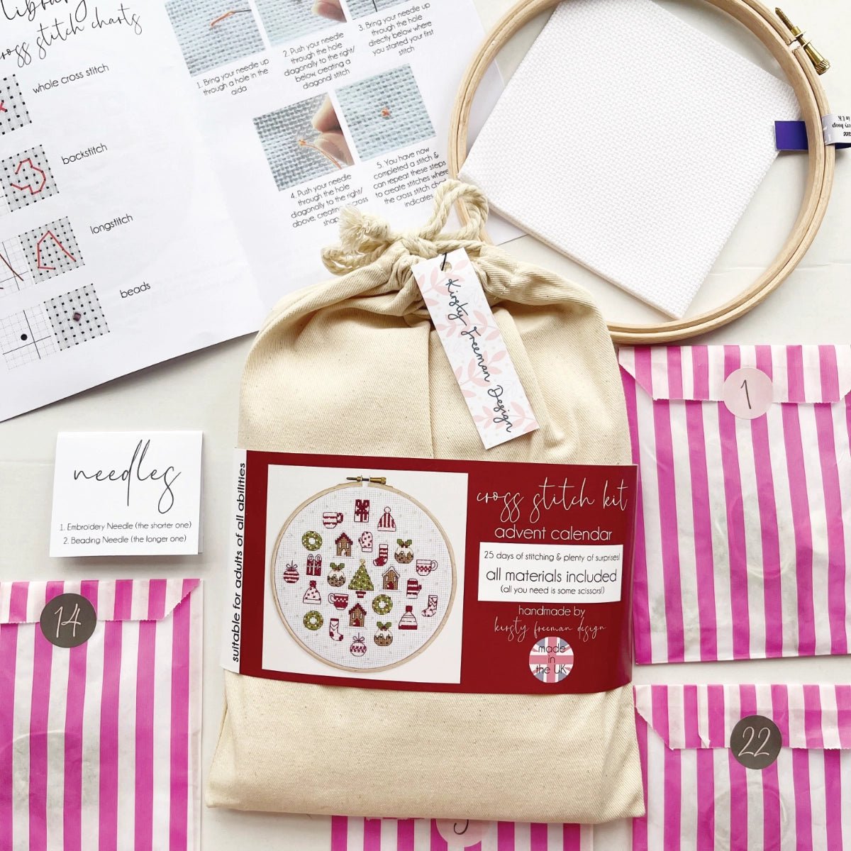 Advent Calendar Cross Stitch Kit contents – embroidery hoop, aida, instructions, needles and packaging displayed together.