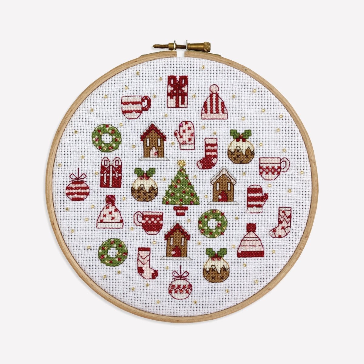 Close-up of Advent Calendar Cross Stitch design showing 25 detailed festive motifs in a 7-inch hoop.