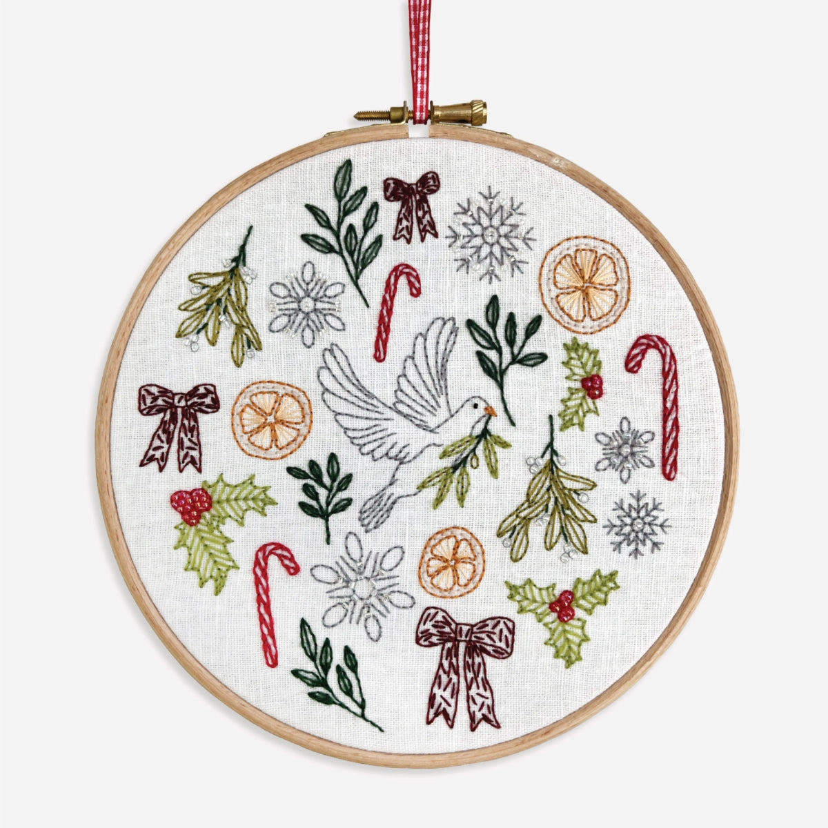 Close-up of completed Advent Calendar Embroidery design showing 24 detailed festive motifs in a 7-inch hoop.