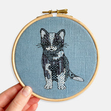 Load image into Gallery viewer, Cat Embroidery Kit - Kirsty Freeman Design. A closer look at the cat stitched in black and white, using DMC stranded cotton, Appletons crewel wool and Toho seed beads.
