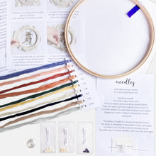 Load image into Gallery viewer, Flower Cross Stitch Kit - Kirsty Freeman Design. Our kit contains detailed instructions, an Elbesee embroidery hoop, 14 count white aida, John James needles, Toho seed beads, a bobbin of thread and DMC stranded cotton.
