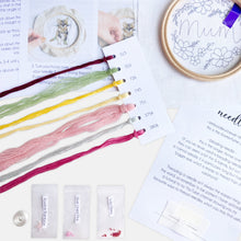 Load image into Gallery viewer, Mum Embroidery Kit - Kirsty Freeman Design. A closer look at all of the materials you will receive in the kit, including the personalised linen fabric to stitch on top of.

