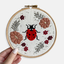 Load image into Gallery viewer, Insect Embroidery Kit Collection - Kirsty Freeman Design.  The ladybird embroidery kit, stitched in autumnal colours, using satin stitch, back stitch and bead embellishment.
