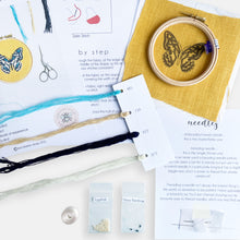 Load image into Gallery viewer, Butterfly Embroidery Kit - Kirsty Freeman Design. A close up of the materials included inside the kit, designed as a relaxation gift for her uk.
