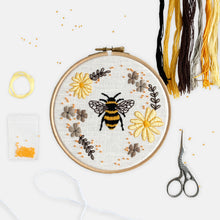 Load image into Gallery viewer, Bee Embroidery Kit - Kirsty Freeman Design. Sit down and relax with our calming embroidery kit, creating using threads in shades of orange, yellow and grey. A premium selection of threads, beads and fabric are supplied to help you create your own beautiful embroidery.
