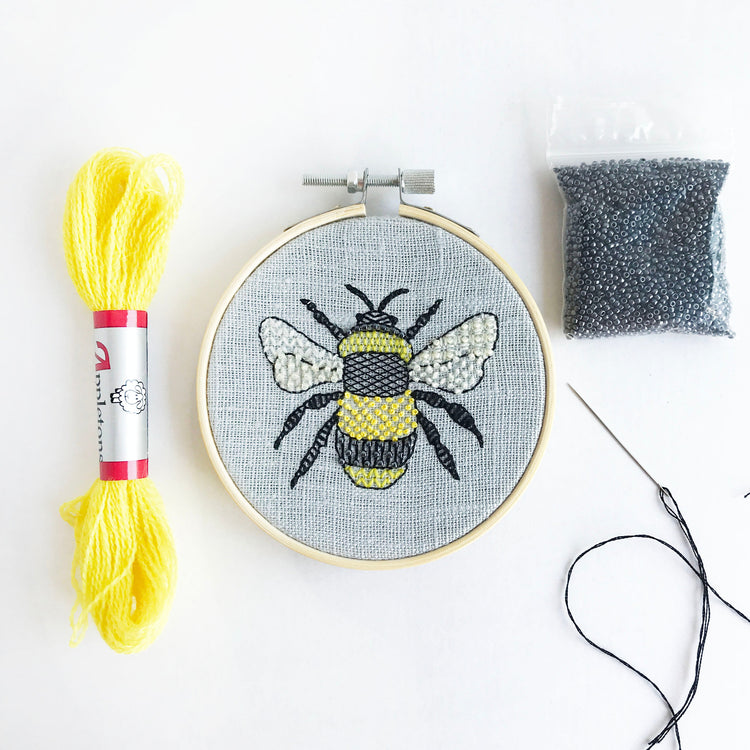 Animal Embroidery Kits - Kirsty Freeman Design. This is our modern animal embroidery kit range, which includes our bee embroidery design on a pale blue linen fabric.