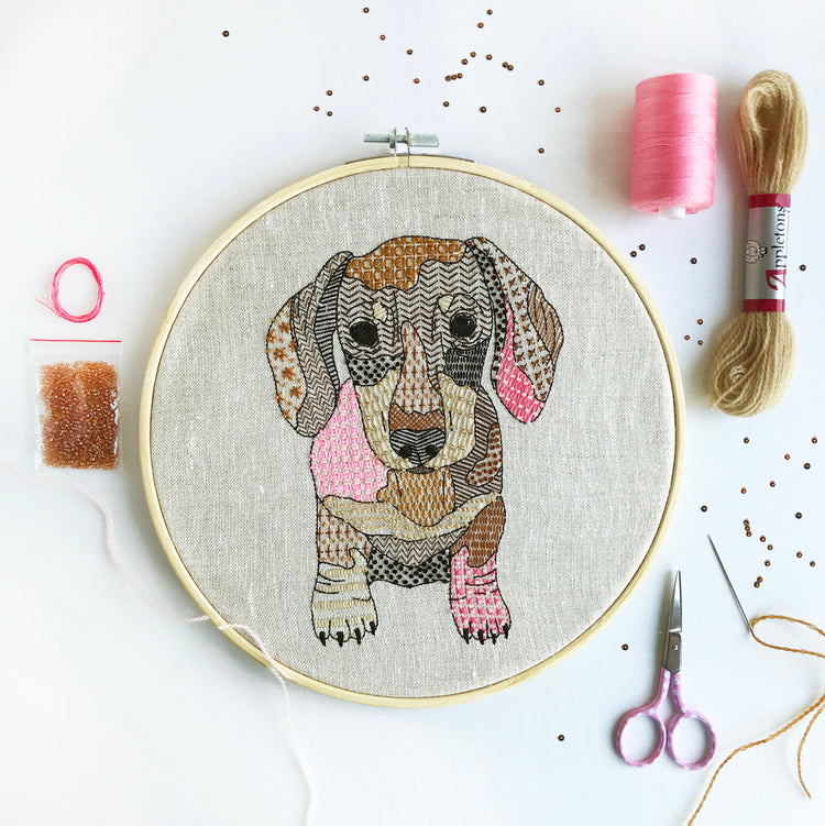 Modern Embroidery Kits Handmade in the UK - Kirsty Freeman Design. A selection of beaded embroidery kits focusing on aniamls, florals and personalised designs. This modern embroidery kit is a dachshund filled with unique, contemporary embroidery stitches.