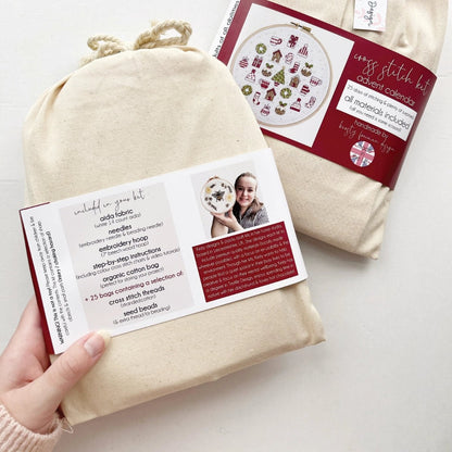Back of Advent Calendar Cross Stitch Kit packaging showing cotton bag and label details.