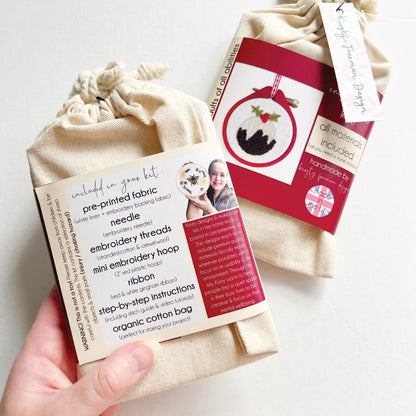 Back of Mini Christmas Pudding Embroidery Kit packaging displaying included materials inside kit.