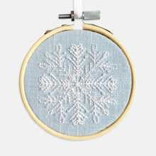 Load image into Gallery viewer, Christmas Snowflake Embroidery Kit - Kirsty Freeman Design. A close up of the blue Christmas snowflake pattern, stitched using stranded cotton and crewel wool.
