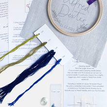 Load image into Gallery viewer, Baby Embroidery Kit - Kirsty Freeman Design. Everything included inside the kit, for you to create a handmade baby gift: personalised fabric, embroidery hoop, threads, needles, beads and instructions.
