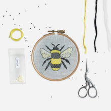 Load image into Gallery viewer, Bee Embroidery Kit Designed and Made in the UK - Kirsty Freeman Design. Bumble bee embroidered onto blue linen fabric using modern embroidery stitches.
