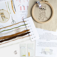 Load image into Gallery viewer, Cat Embroidery Kit - Kirsty Freeman Design. Contents of the ginger kitten embroidery kit. Everything is included, making it the perfect creative hobby to do at home or on the go.
